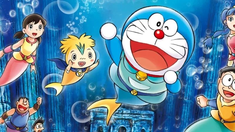 Doraemon dễ thương vẫy như một hình nền hài hước cho máy tính